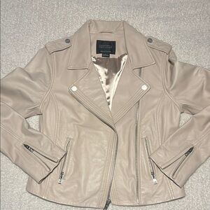 Cream Leather Motorcycle Jacket with Zipper Details and Fitted Silhouette